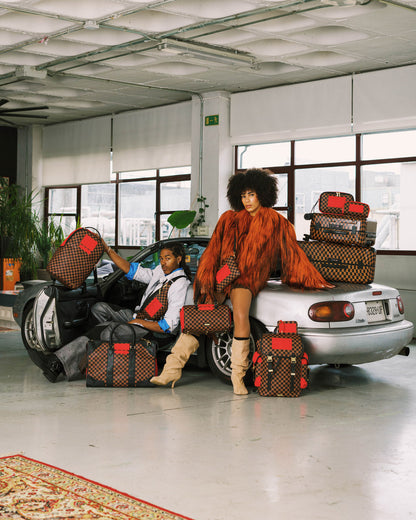 SPRAYGROUND® LUGGAGE RED REDEMPTION FULL-SIZE LUGGAGE