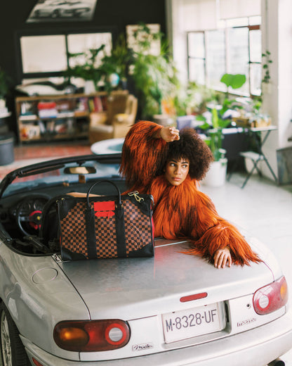 SPRAYGROUND® DUFFLE RED REDEMPTION PYRAMID DUFFLE