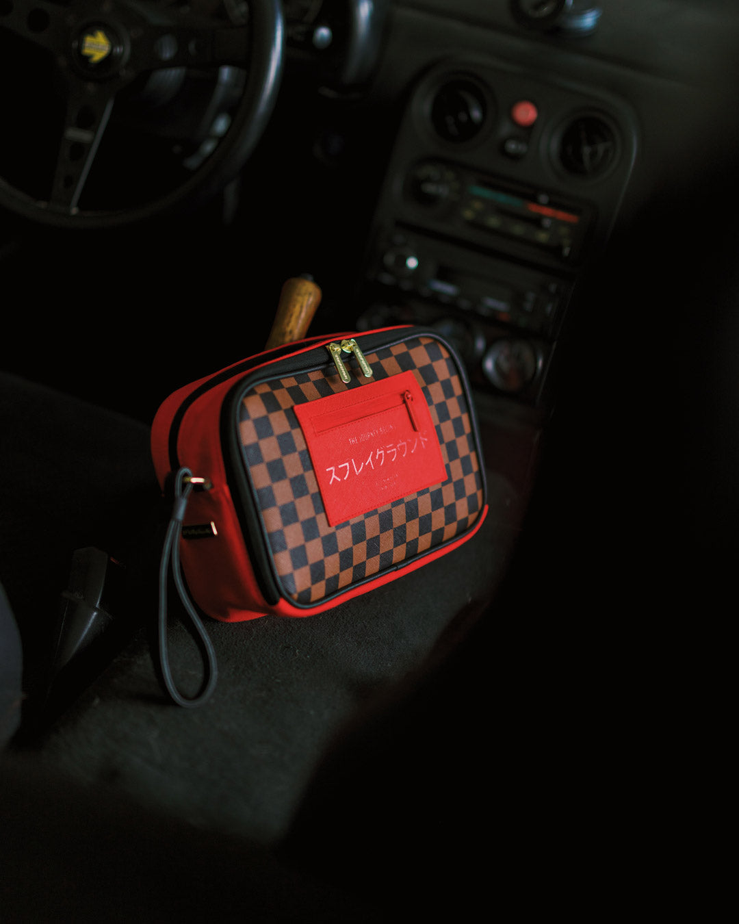 SPRAYGROUND® TOILETRY RED REDEMPTION TOILETRY BRICK