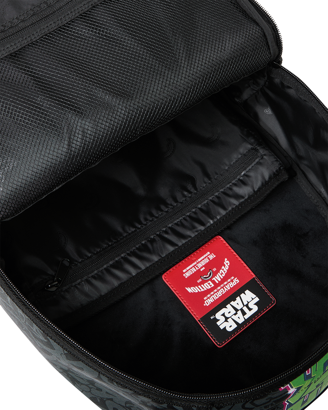 SPRAYGROUNDÂ® BACKPACK STAR WARS VADER HALF GRAFF BACKPACK