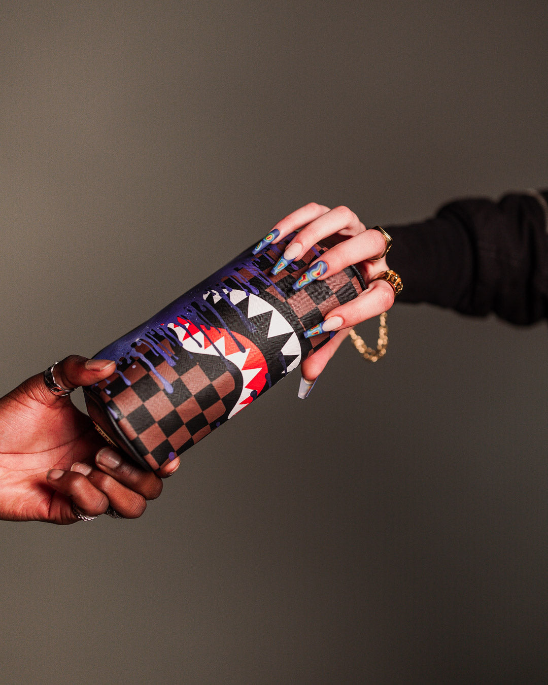 SPRAYGROUND® POUCH LOST IN SPACE DRIP POUCH