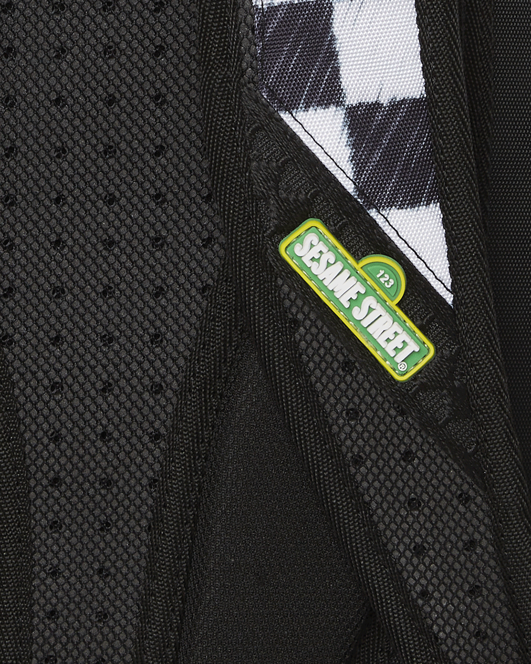 SPRAYGROUND® BACKPACK SESAME STREET GANG DLXR MINI BACKPACK